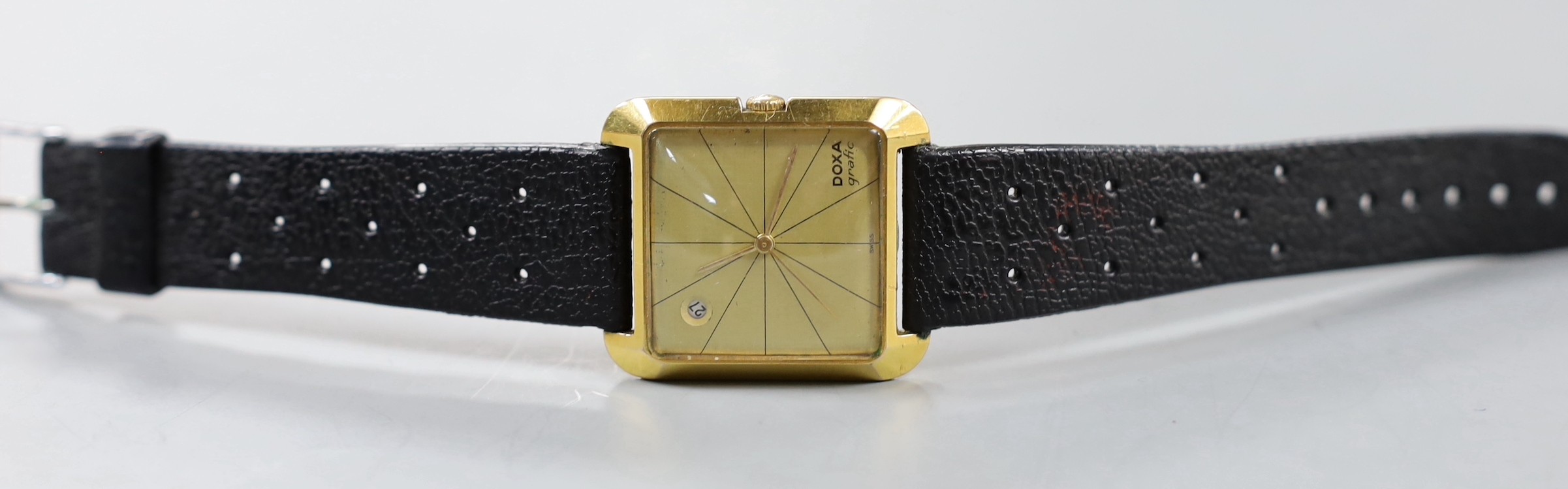 A gentleman's steel and gold plated Doxa Grafic manual wind wrist watch, with date aperture.
